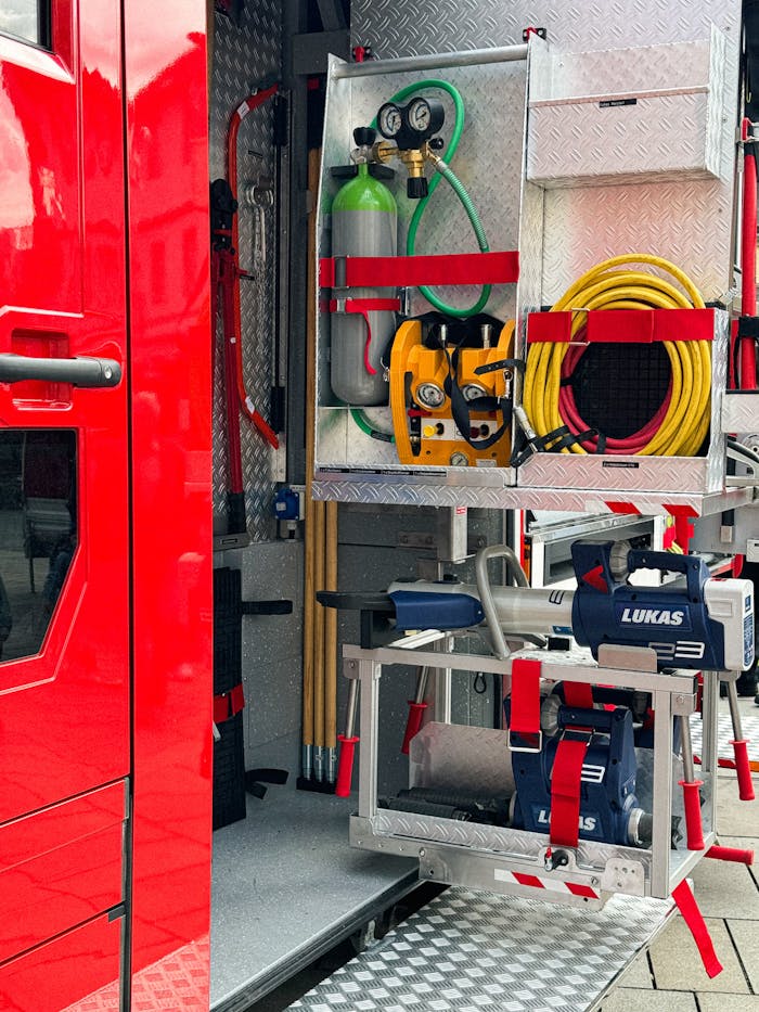 Fire truck with rescue equipment in Bayreuth, Germany, showcasing tools and safety gear.